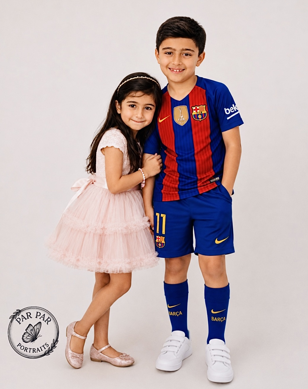 Brother and sister standing together in the North York studio, Toronto family photography